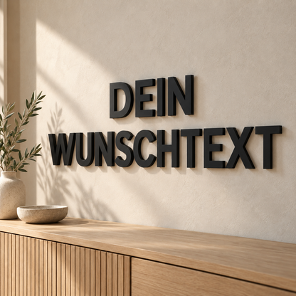 Schwarze 3D-Wandbuchstaben DEIN WUNSCHTEXT mit 20 cm Buchstabenhöhe in moderner Schrift