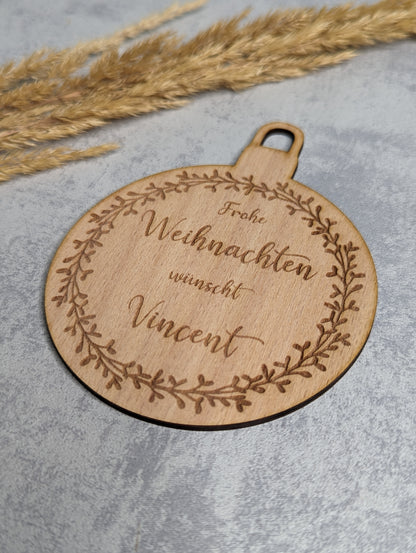 Personalisierte Weihnachtskugel aus Buchenholz - Die Bildschneiderei