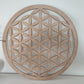 Holzdeko mit Blume des Lebens Motiv, runde Wanddekoration aus Naturholz – spirituelles Symbol für Harmonie und Energie.